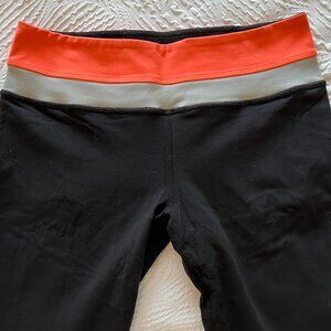 Women's Lululemon Reversible Black, Coral Leggings Size 6 Used/Fair Condition
